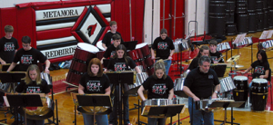 Students play steel drums in a school band